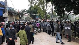 Public security officers secure the scene on January 9 (Photo: VNA)