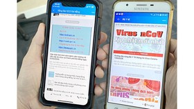 Information about nCoV appears on mobile apps. (Photo: SGGP)