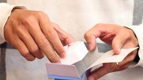 The nCoV test kit made in Vietnam (Photo: SGGP)