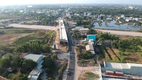 National Highway No.50 in Binh Chanh District is one of the city's key projects (Photo: SGGP)