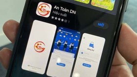 The app ‘An Toan DN’ helps businesses to self-evaluate Covid-19 safety status. (Photo: SGGP)