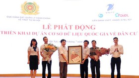 The ceremony to launch the project to build a national database on citizens on July 20 in Hanoi. (Photo: SGGP)