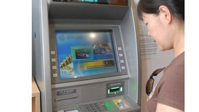 Retirees are encouraged to receive pension through ATM (Photo: SGGP)