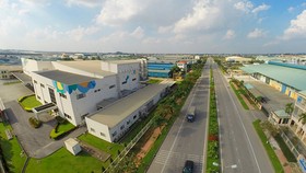 COVID-19 has caused temporary difficulties for upcoming business plans, but with a long-term investment strategy, industrial real estate in Vietnam is still very attractive. —Photo doanhnghiepphattrien.vn