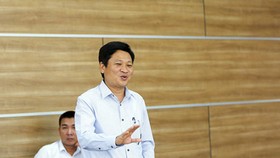 Deputy Director General Nguyen Khac Lich delivered his speech in the discussion. (Photo: SGGP)