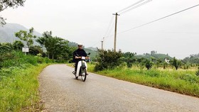 A road in Trugn Thanh Commune in Ha Giang Province was built from social contribution (Photo: SGGP)