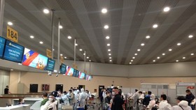 Passengers check in at the airport of Moscow