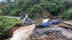 Huge flooding separates traffic roads through Bat Xat District, Lao Cai Province
