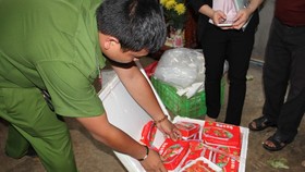 The functional forces discover foam boxes containing smuggled fresh strawberries