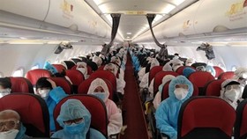 Nearly 300 Vietnamese citizens brought home from US, Japan
