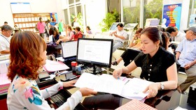 Chuyển mạnh sang thủ tục trực tuyến để giảm tham nhũng vặt