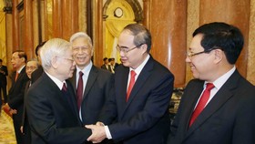 Party General Secretary and President Nguyen Phu Trong chairs a get-together on the occasion of the traditional Lunar New Year on January 22 with veteran revolutionaries, current and former leaders of the Party, State, Vietnam Fatherland Front, and overs