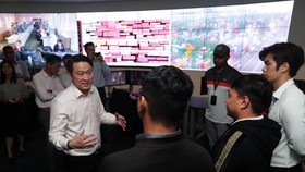 Singaporean Senior Minister of State for Transport and Health Lam Pin Min during a visit to PSA Singapore at Pasir Panjang Terminal Building 3 on February 12 (Photo: straitstimes.com)