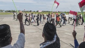 Indonesian citizens return home after 14-day quarantine on Natuna island. (Photo: Antaranews)