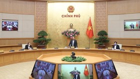 PM Nguyen Xuan Phuc speaks at the meeting (Photo: VNA)