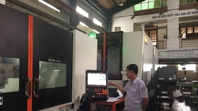 Many businesses in HCMC have been making effort to maintain production and increase market share (Photo: SGGP)