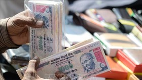 Đồng rupee của Ấn Độ. Ảnh: AFP/TTXVN