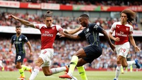 Man.City - Arsenal sẽ là trận cầu hâm nóng cho ngày trở lại. Ảnh: Getty Images
