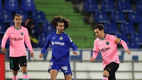 Lionel Messi mờ nhạt khiến Barcelona thất thủ tại Getafe. Ảnh: Getty Images