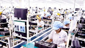 Một dây chuyền lắp ráp thiết bị điện tử ở Việt Nam