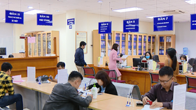 Nhiều loại phí, lệ phí giảm đến 50%