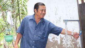 Niềm vui có nước sạch của người dân ấp An Hòa, xã An Thới Đông, huyện Cần Giờ