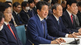 Japanese Prime Minister Shinzo Abe speaks at a government coronavirus task force meeting in Tokyo on Thursday. (Photo by Uichiro Kasai)