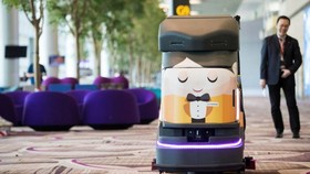 An automated robotic cleaner at Changi Airport in Singapore. The city-state leads south-east Asia in AI adoption, and hospitality is a key sector for the technology © Bloomberg