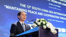 Thứ trưởng Thường trực Bộ ngoại giao Bùi Thanh Sơn phát biểu tại Hội thảo khoa học quốc tế về biển Đông lần thứ 12. Ảnh: TTXVN