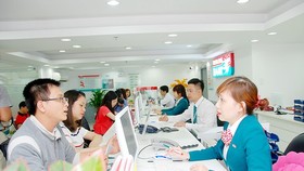 Ngân hàng giảm lãi suất cho nông dân và doanh nghiệp