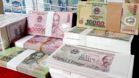 Rầm rộ dịch vụ đổi tiền lẻ, tiền mới