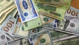 NHNN tiếp tục điều chỉnh tăng tỷ giá trung tâm