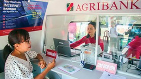 Vay tiêu dùng kích tổng cầu, lo nợ xấu