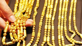 Giá vàng kỳ hạn tăng dù thị trường chứng khoán Mỹ lên điểm