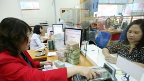 Ngân hàng giảm lãi suất, tăng hỗ trợ cho doanh nghiệp trong đại dịch