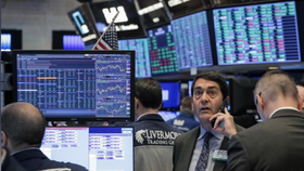 Nhân viên giao dịch trên sàn chứng khoán New York ngày 20/3. Ảnh:Reuters