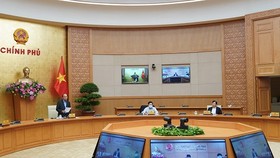 Thủ tướng Nguyễn Xuân Phúc chủ trì cuộc họp Thường trực Chính phủ nghe báo cáo của Ban Chỉ đạo quốc gia về phòng chống dịch COVID-19 - Ảnh: VGP/Quang Hiếu