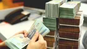 Nợ xấu tăng cao sẽ ảnh hưởng tiêu cực đến hệ thống tài chính Việt Nam. (Ảnh minh họa: KT)