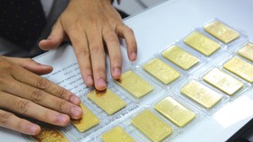 Cũng như cổ phiếu, vàng chỉ là công cụ đầu tư, sẽ thay đổi vì dòng tiền và niềm tin. Ảnh: Đức Thanh