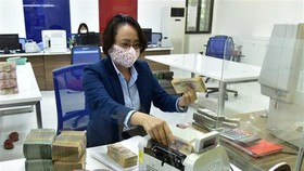 Hoạt động nghiệp vụ tại VietinBank. (Ảnh minh họa: Trần Việt/TTXVN)