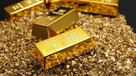Giá vàng trong nước giảm ngược chiều với giá vàng thế giới. (Ảnh: KT)