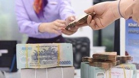 Thị trường trái phiếu doanh nghiệp tăng trưởng nóng tiềm ẩn nhiều rủi ro. (Ảnh minh họa: KT)