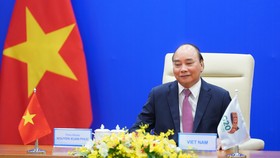 Thủ tướng Nguyễn Xuân Phúc phát biểu tại Hội nghị Thượng đỉnh G20.Ảnh VGP/Quang Hiếu