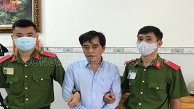 Đối tượng Tính lúc bị bắt. Ảnh: CA