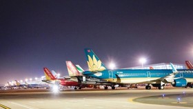 Cảnh giác đối tượng lừa đảo mua vé máy bay về nước tránh dịch