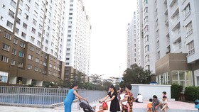 Cuộc sống ở chung cư luôn đề cao mối quan hệ cộng đồng. Ảnh: CAO THĂNG