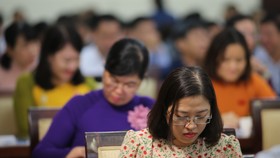 Đại biểu tham dự Kỳ họp thứ 20 HĐND TPHCM khóa IX vào ngày 11-7. Ảnh: DŨNG PHƯƠNG