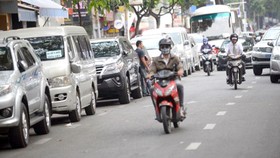 TP.HCM: giữ xe máy giá cao, giữ ôtô giá thấp
