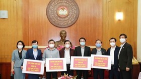 The VFF central Committee receives funds from the Party Central Committee Office, the Government Office, the National Assembly Office, and the President Office (Photo: dangcongsan.vn)