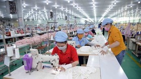 A face mask production line. (Photo: VNA)